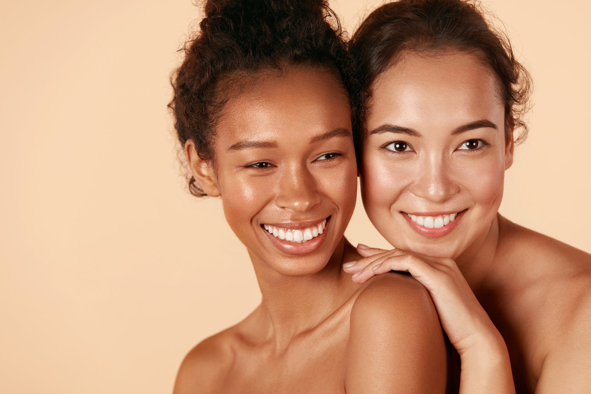 Woman with glowing, radiant skin after using Sensita - skincare products